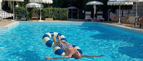 Seasonal outdoor pool, pool umbrellas, sun loungers