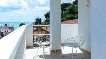 Suite Deluxe, vista al mar | Terraza o patio