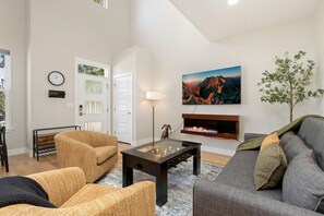 Smart TV, fireplace, table football, books