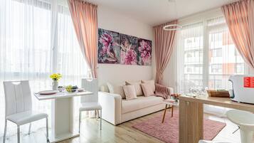 Deluxe Apartment, 1 Bedroom | Living area | 40-cm flat-screen TV with cable channels