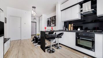 Apartment, 1 Bedroom, Balcony | Private kitchen | Full-size fridge, microwave, oven, stovetop