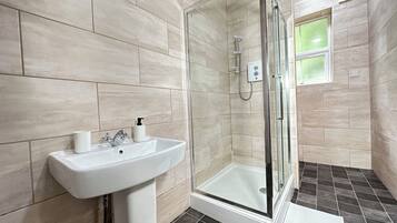 Hair dryer, towels, toilet paper