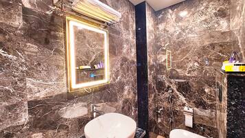 Shower, rainfall showerhead, towels, soap