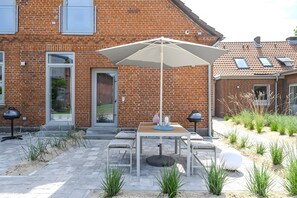 Outdoor dining - Lütter Lünk – Exclusive Loft with Terrace (Fehmarn)
