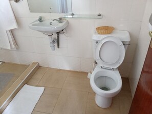Shower, free toiletries, slippers, towels