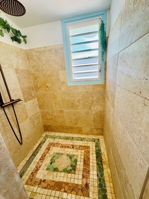 Shower, hair dryer, towels, toilet paper