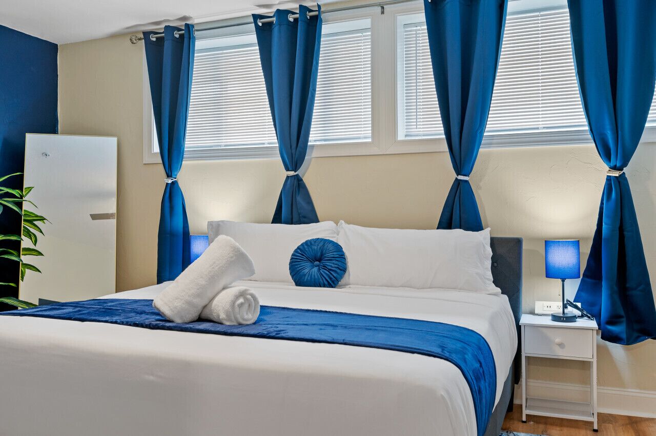 1 bedroom, desk, iron/ironing board, travel crib