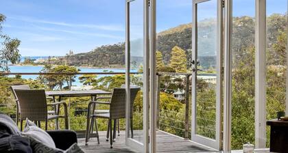 Coastal style—just steps from the beach, river, and local cafés