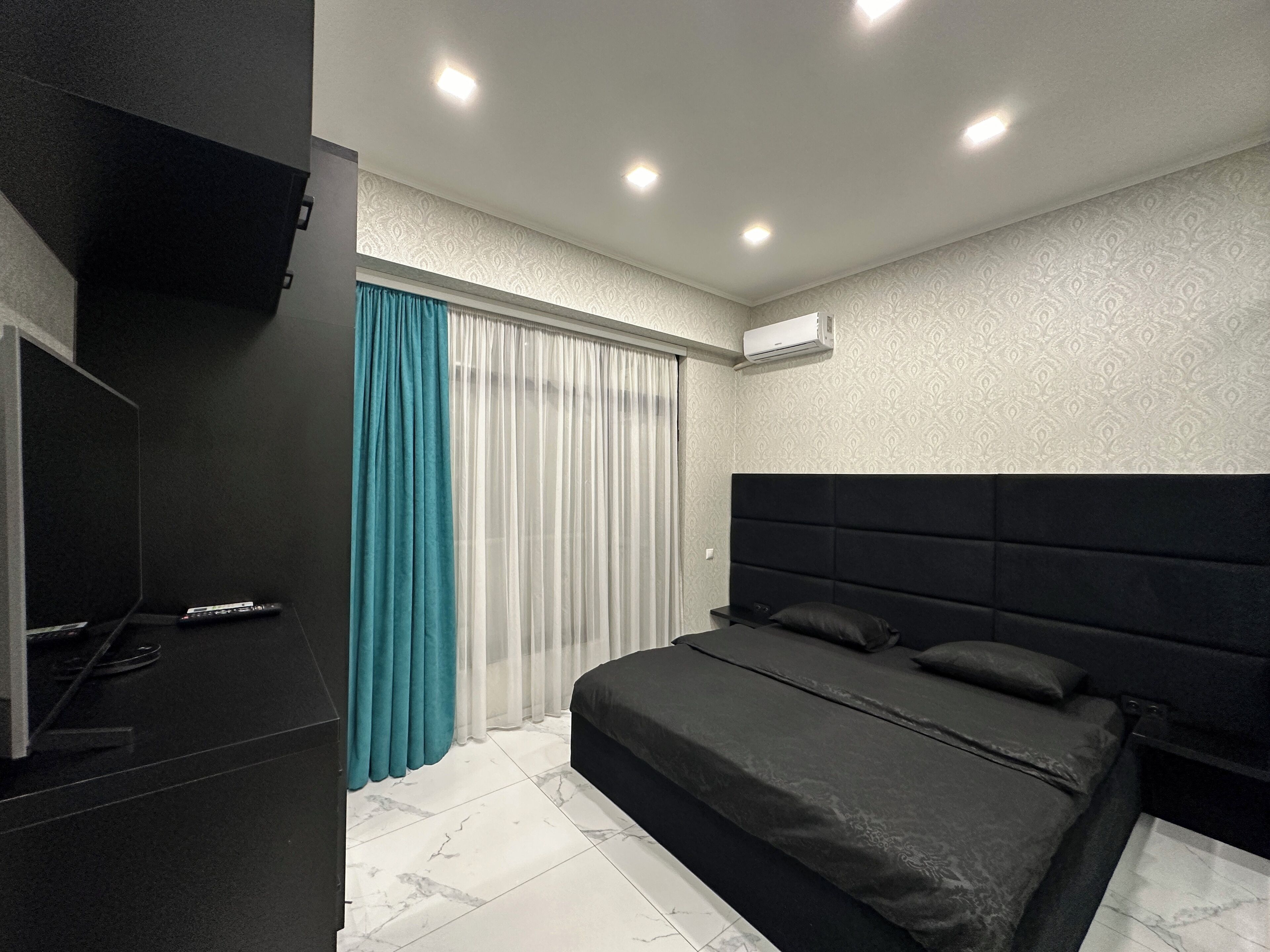 Business Apartment, Balcony | Desk, laptop workspace, blackout drapes, iron/ironing board