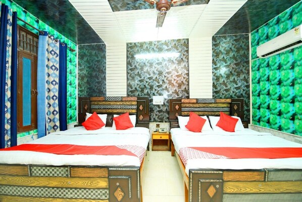 Deluxe Quadruple Room, City View | Free WiFi, bed sheets - Hotel Kiran HP (Jhanduta)