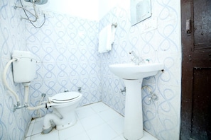 Shower, rainfall showerhead, towels, soap