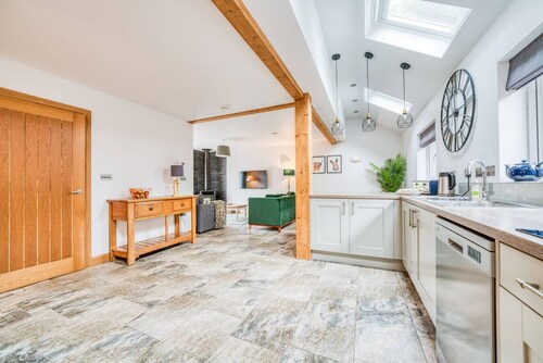 Spacious 8-bedroom estate with gardens, fireplaces and room for 24