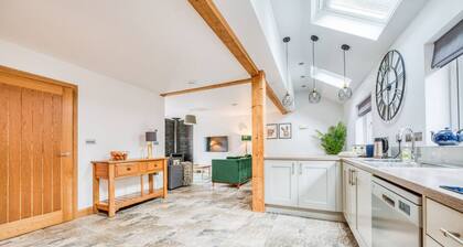 Spacious 8-bedroom estate with gardens, fireplaces and room for 24