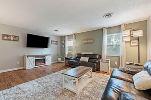 Smart TV, fireplace, books