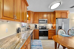 Fridge, dishwasher, coffee/tea maker, toaster