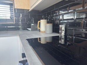Oven, stovetop, dishwasher, coffee/tea maker