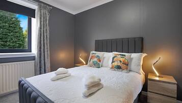 2 bedrooms, desk, iron/ironing board, travel crib