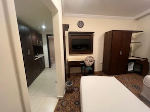 Family Suite, City View | In-room safe, blackout drapes, soundproofing, iron/ironing board