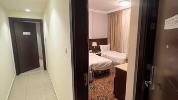 Perhesviitti, kaupunkinäköala | Ylelliset vuodevaatteet, tallelokero huoneessa, pimennysverhot