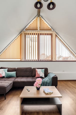 Family Apartment, 2 Bedrooms, Balcony, City View | Living area | 40-cm flat-screen TV with cable channels. ARI Central Grand Apartments-Luxury Stay