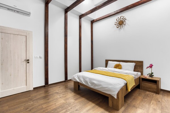 Family Apartment, 2 Bedrooms, Balcony, City View | Desk, laptop workspace, iron/ironing board, free cribs/infant beds