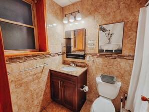 Hair dryer, towels, soap, shampoo