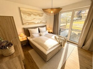 2 habitaciones, tabla de planchar con plancha y cuna de viaje 
