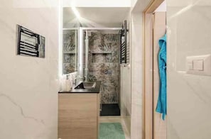 Hair dryer, bidet, towels, soap