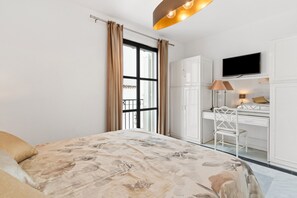 1 غرفة نوم ومكواة/لوح كي وواي فاي وملاءات أسرّة