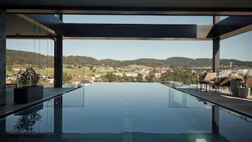 Indoor pool, outdoor pool, open 7:00 AM to 10:00 PM, pool umbrellas