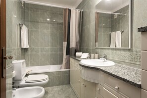 Hair dryer, bidet, towels