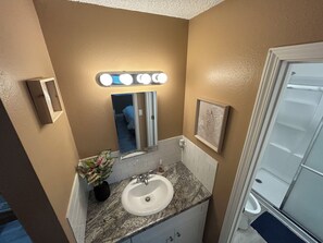 Shower, towels, soap, toilet paper