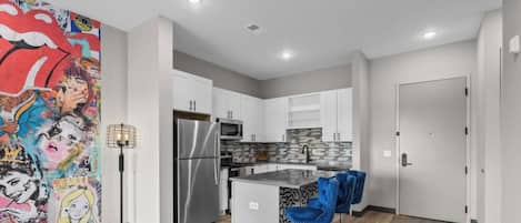 Coffee/tea maker, fridge, microwave, oven
