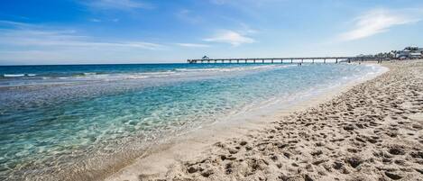 On the beach, sun-loungers, beach umbrellas