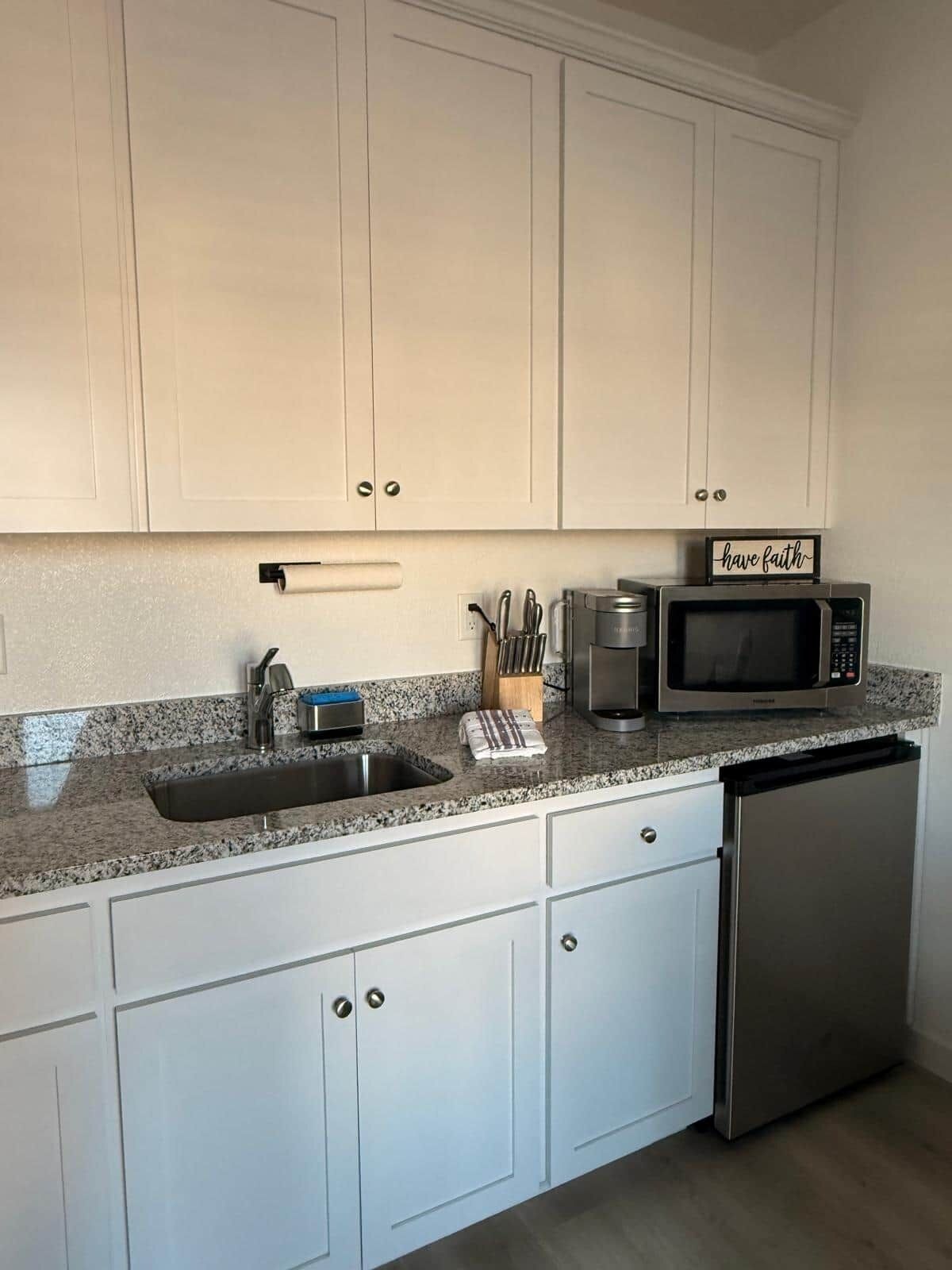 Fridge, microwave, coffee/tea maker, toaster