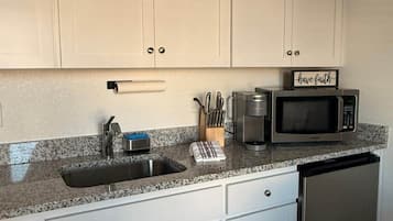 Fridge, microwave, coffee/tea maker, toaster