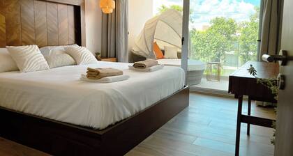 Stylish Playacar Condos w Balcony & Pool