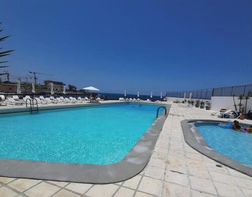 Beach apartment with Pool and direct beach access