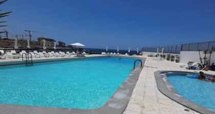 Beach apartment with Pool and direct beach access