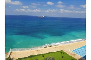 On the beach, sun loungers - Silvia's romantic Byblos beachfront Duplex with an amazing sea view (Byblos)