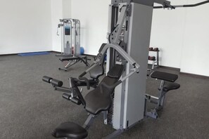 A gym with exercise machines, benches, and a wall-mounted rack. - Mykey Silverscape B-39-07 Melaka City (Melaka)
