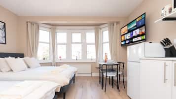 1 dormitorio, tabla de planchar con plancha, Internet y ropa de cama