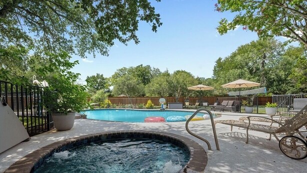 A backyard with a hot tub, a pool, and outdoor furniture. - Austin's Hill Country Escape & Retreat – Private Oasis With Pool & Spa on Acre+ (Austin)