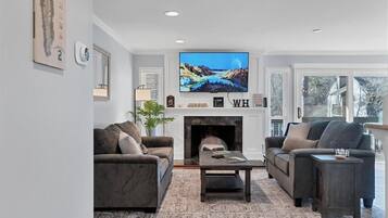 Smart TV, fireplace, foosball