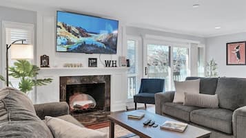 Smart TV, fireplace, foosball