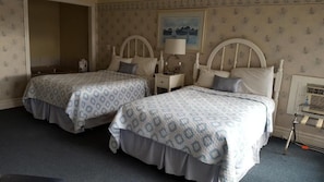 Deluxe Suite, Partial Ocean View | In-room safe, blackout drapes, free WiFi