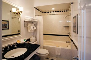 Deluxe Suite, Partial Ocean View | Bathroom | Combined shower/tub, hair dryer, towels, soap - Snug Harbor Inn (Avalon)