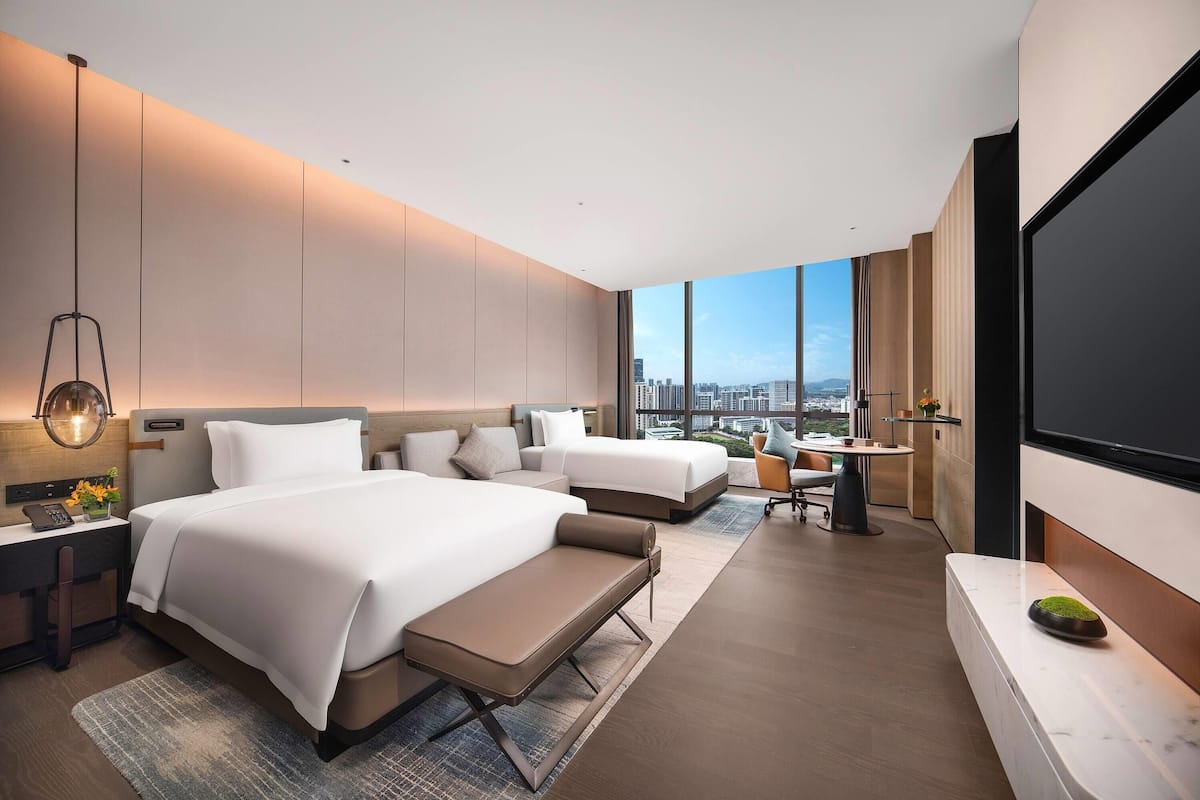 Deluxe kamer, 2 eenpersoonsbedden | Donsdekens, een gratis minibar, een strijkplank/strijkijzer