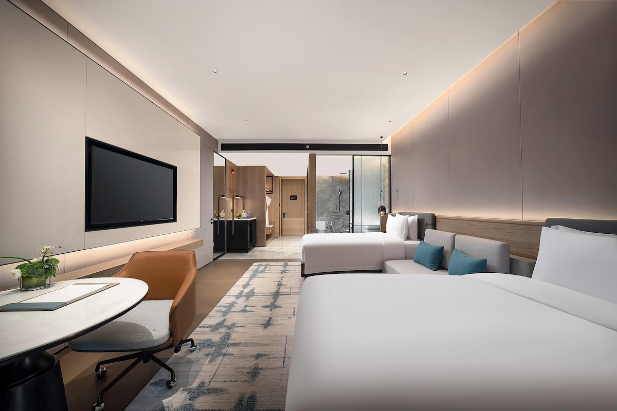 Superior kamer, 2 eenpersoonsbedden | Donsdekens, een gratis minibar, een strijkplank/strijkijzer