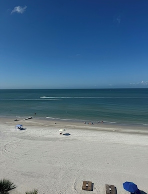 On the beach, sun-loungers